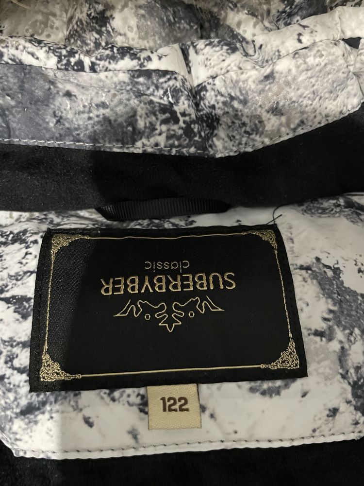 Продам зимний фирменный комбинезон
