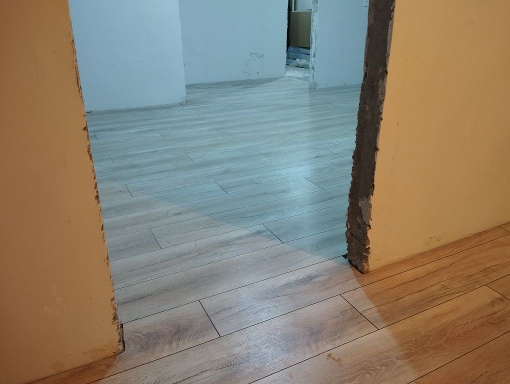 Укладка ламината, линолеума, наливной пол, установка плинтусов