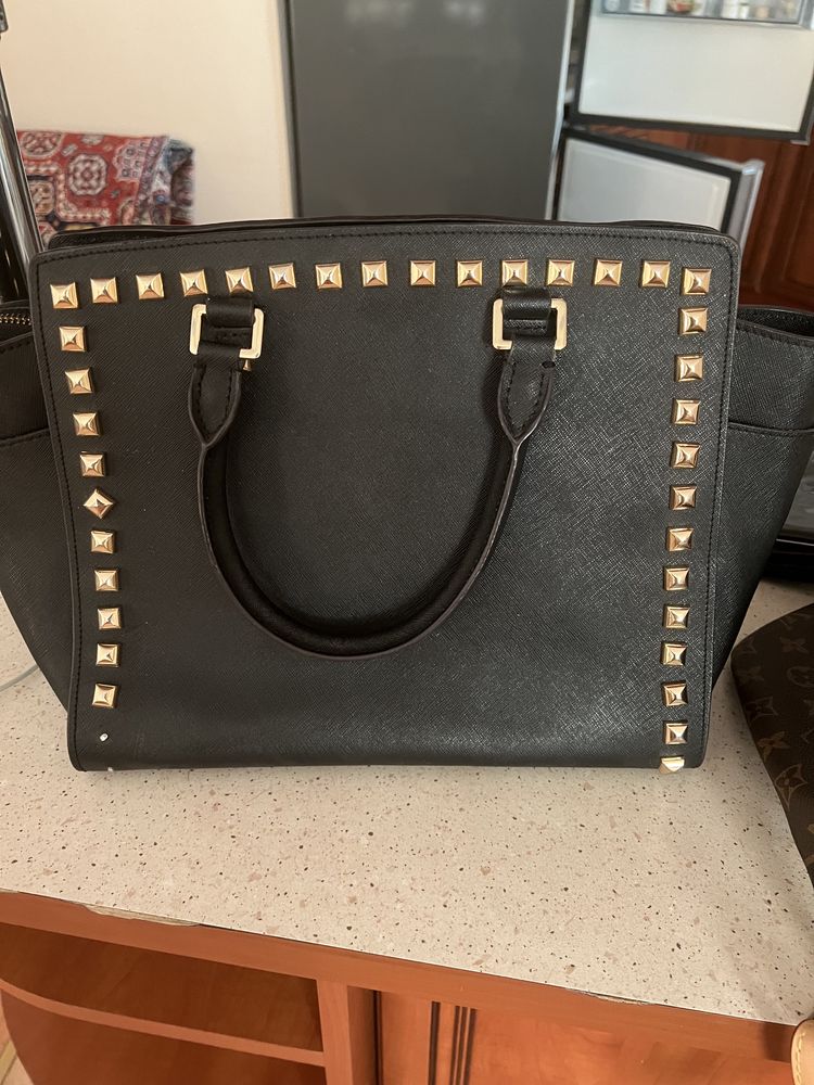 Продам офигенская сумку чистая кожа Michael kors