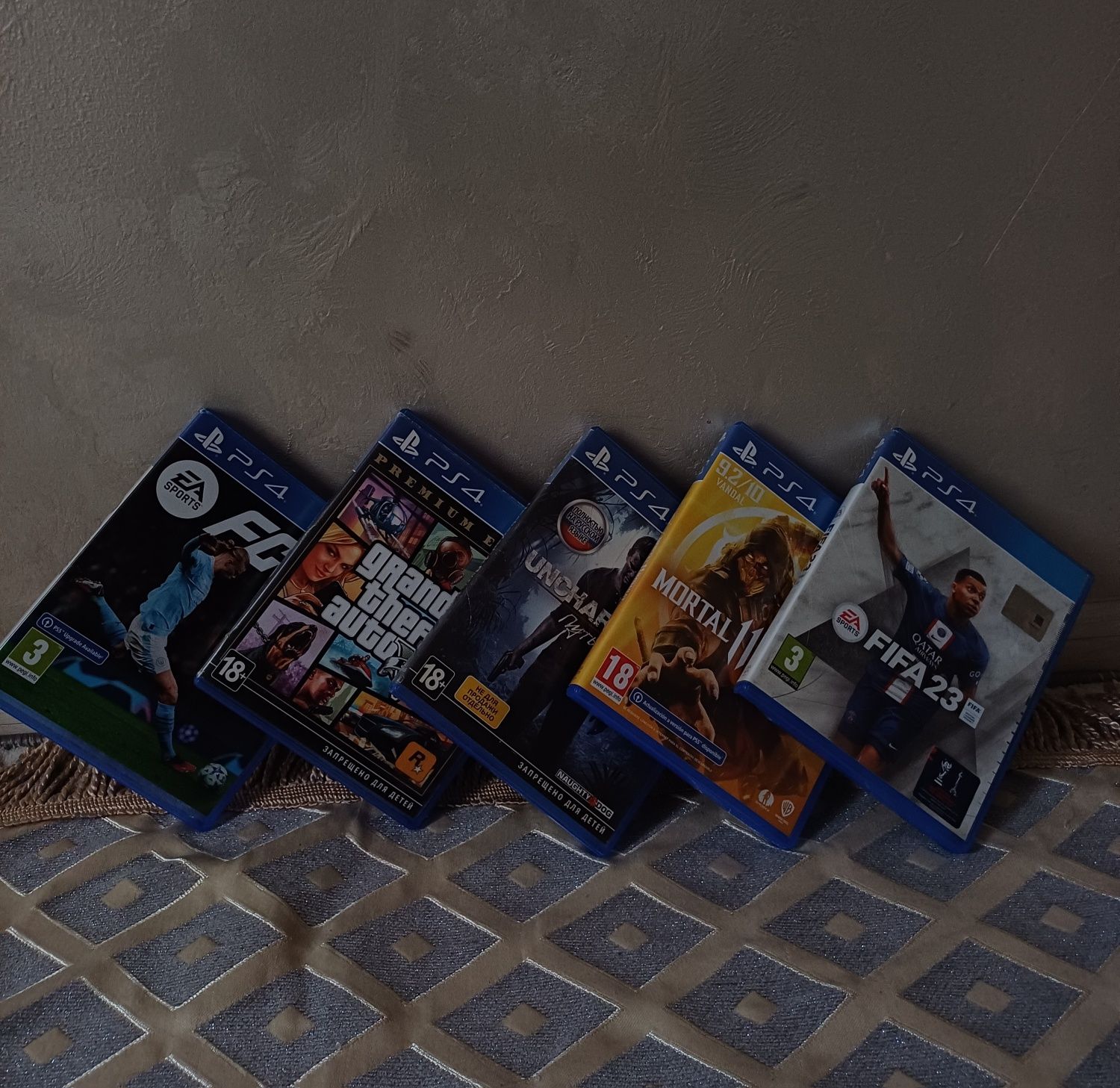 "PS4 500GB с играми FIFA 23, Mortal Kombat, FC24 и Uncharted 4, GTA 5.