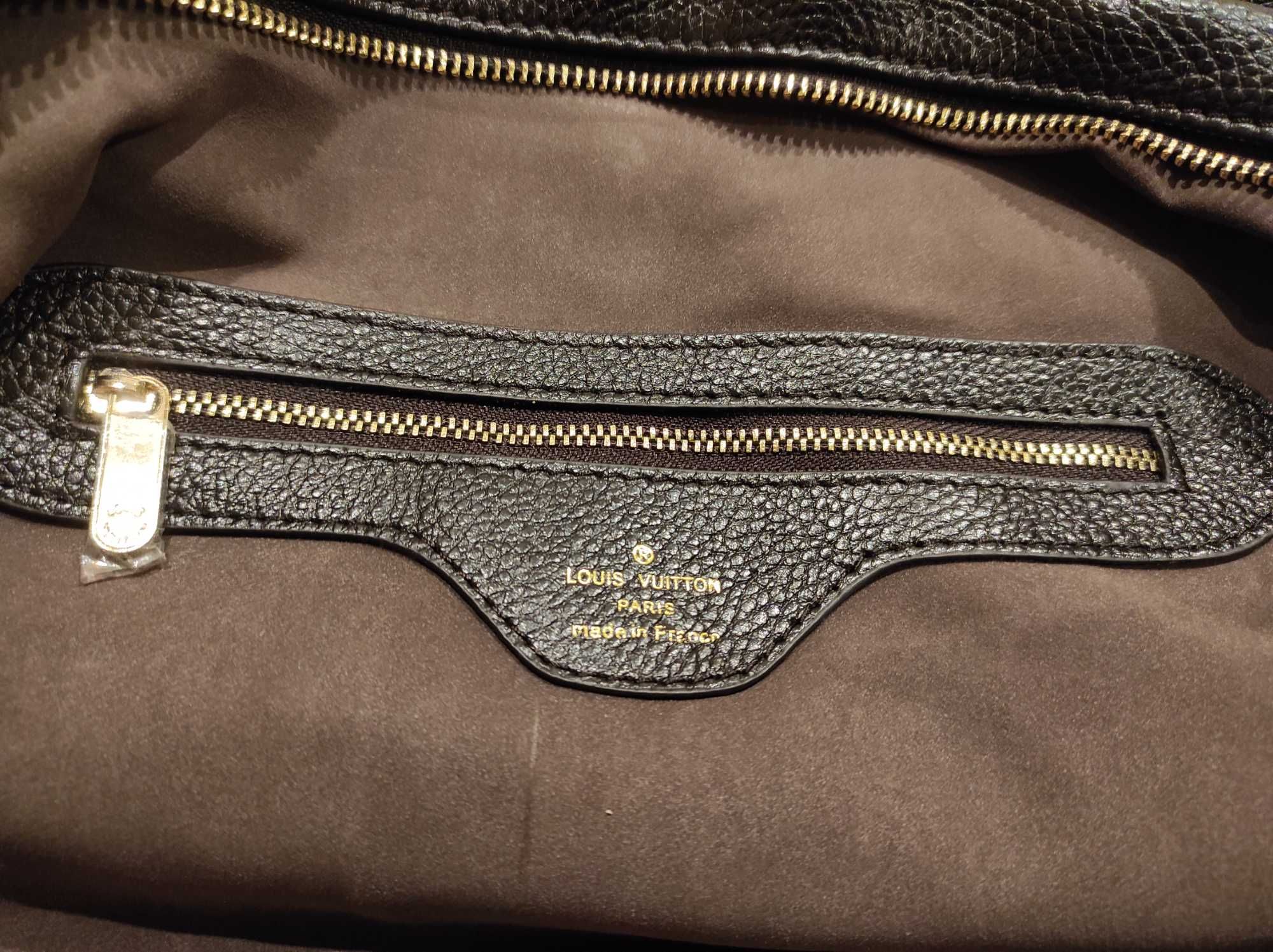 Сумочка то  Louis Vuitton
