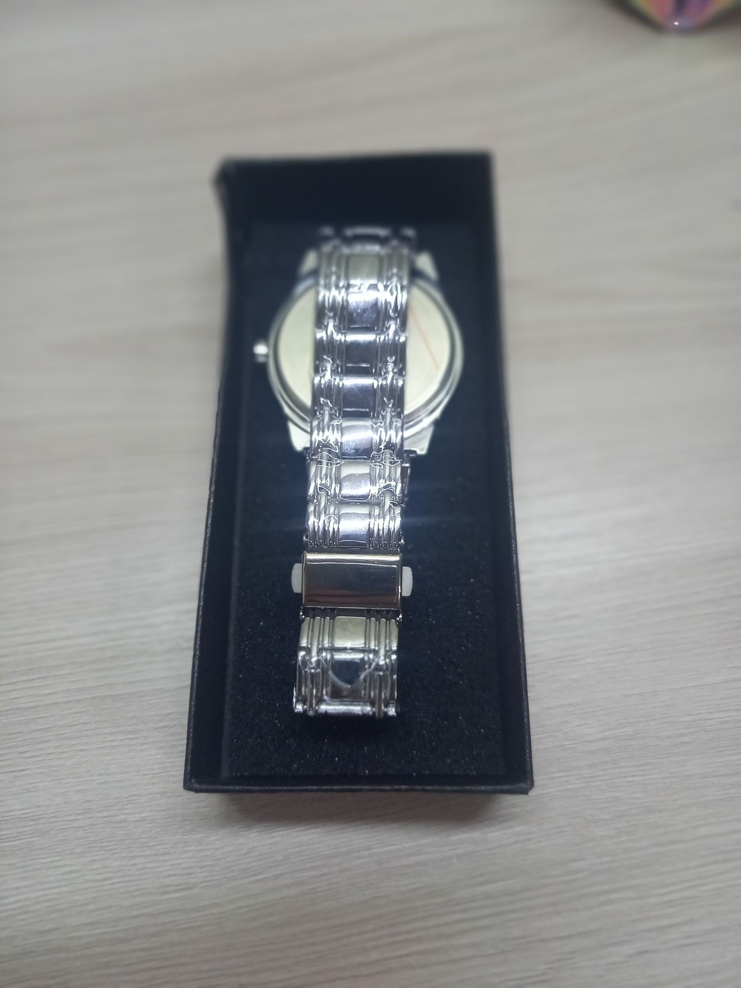 Серебряные золотые часы