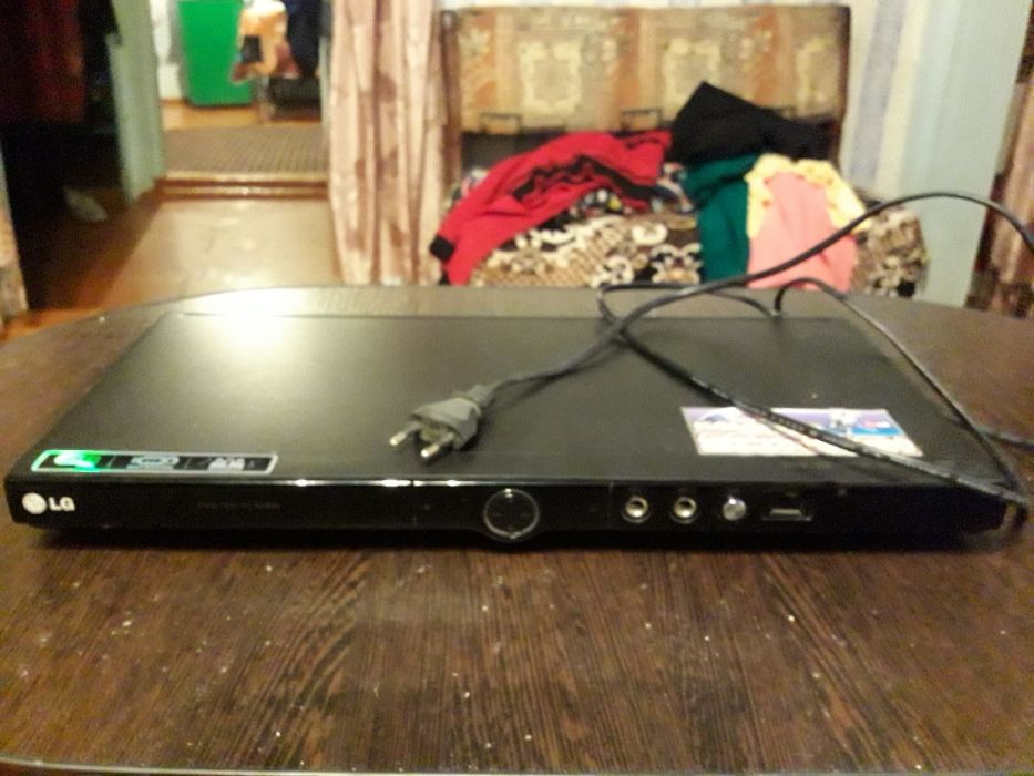 Продам новый DVD проигрыватель DVX 497K+3G USB модем Kcell ZTE.