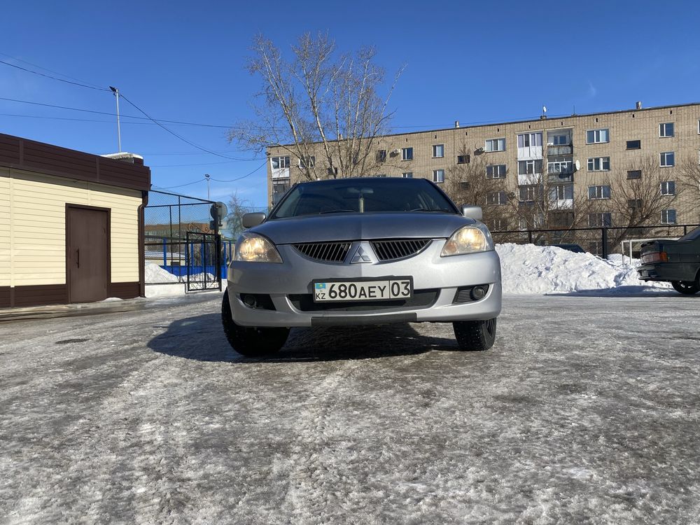 Машину продам лансер в хорошом состояние оброщайтесь по номеру