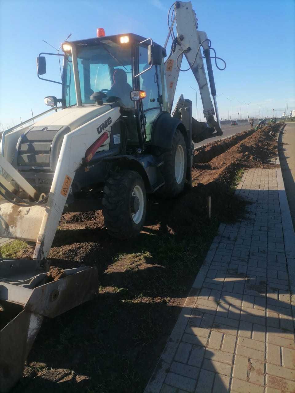 Продам или обменяю Экскаватор-погрузчик UMG TLB825