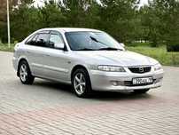 Продам Mazda 626 лифтбек 2001 года автомат
