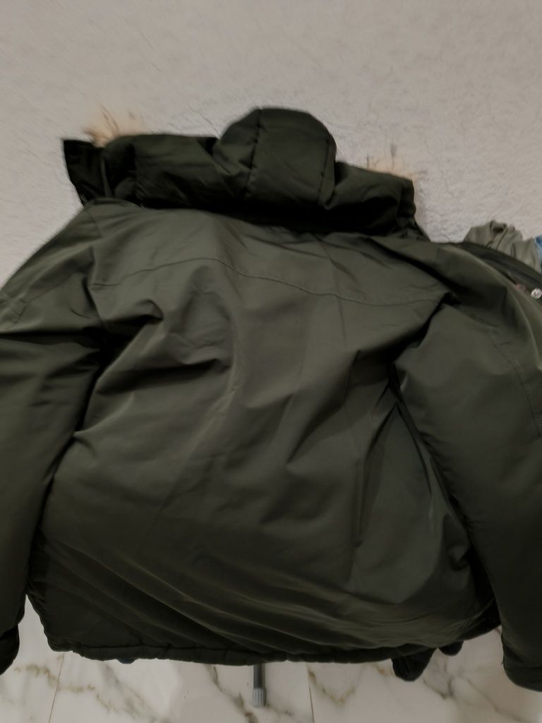 Продам тёплую зимную куртку tnf 50 размер