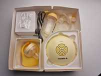 Молокоотсос Medela Swing, электронный двухфазный