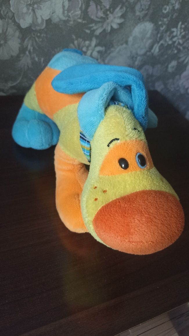 Продам игрушку собачку