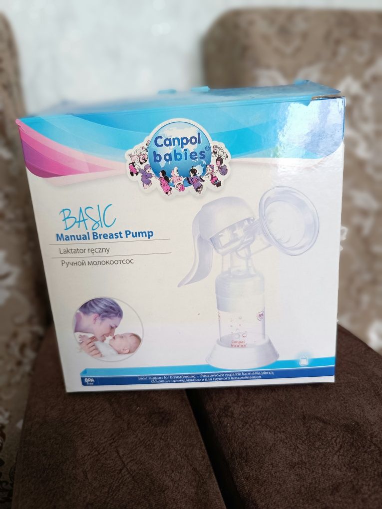 Продам ручной молокоотсос и бутылочку Avent