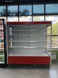 Срочно продам новый витринный холодильник