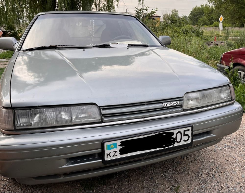 Машина Mazda 626