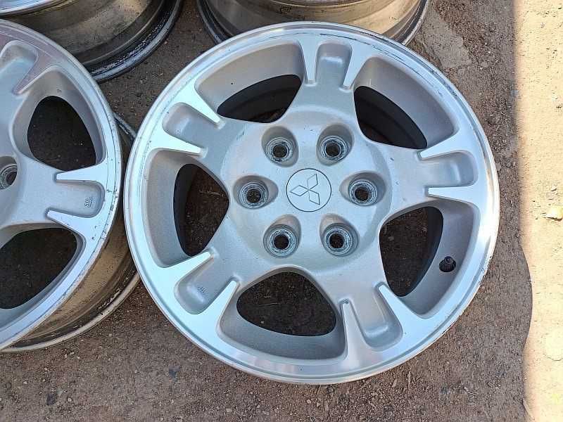 Продам оригинальные легкосплавные диски "ENKEI" на Mitsubishi Pajero