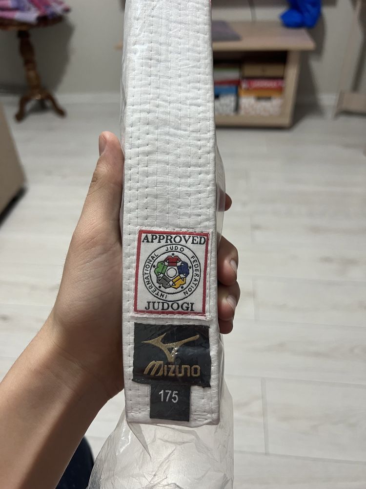 Продам новый белый пояс для дзюдо фирма Mizuno