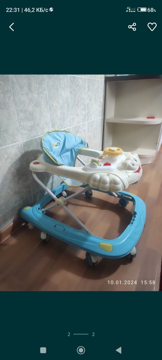 Продам коляску трансформер,ходунки,столик детский