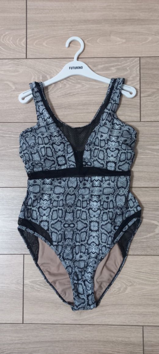 Продам новый купальник