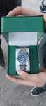 Часы Rolex серого цвета