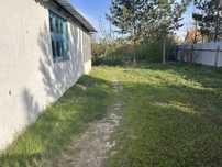 Продам дом в Акимовке 4 комнатный баня гараж тракторМТЗ 80