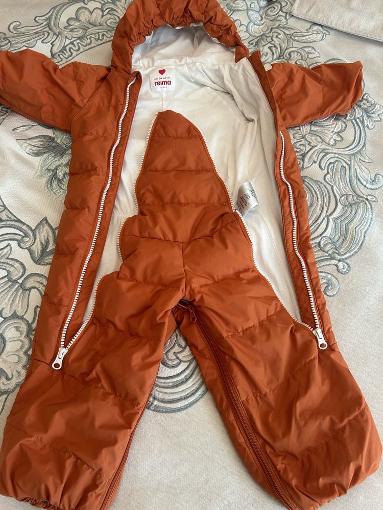 Продам зимний комбинезон финский Reima