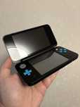 Nintendo New 2DS XL (чёрно-синяя)