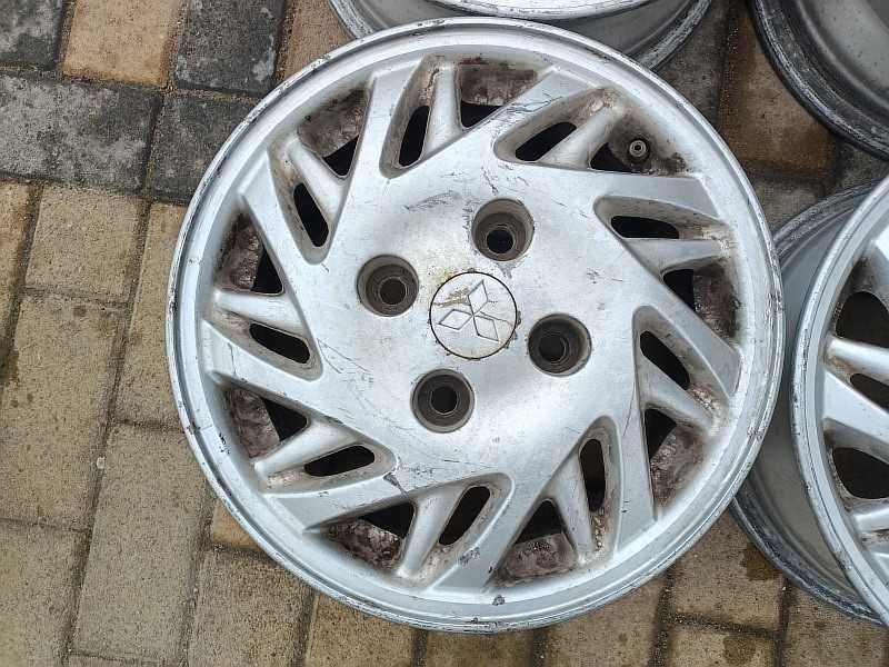 Продам оригинальные легкосплавные диски на Mitsubishi Galant