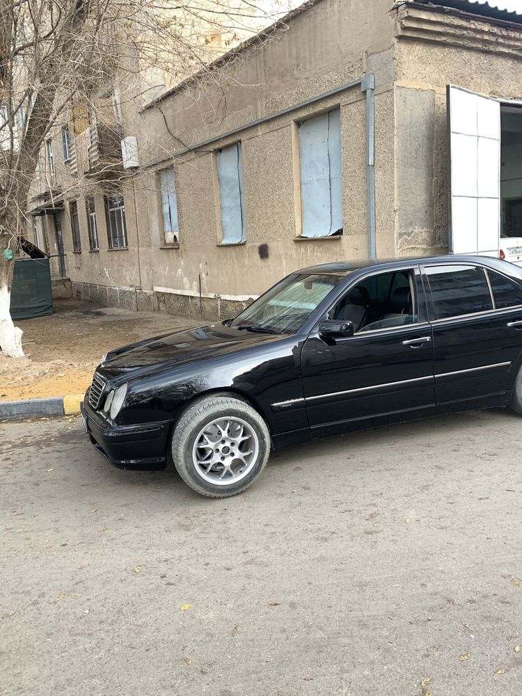 Мерседес 210