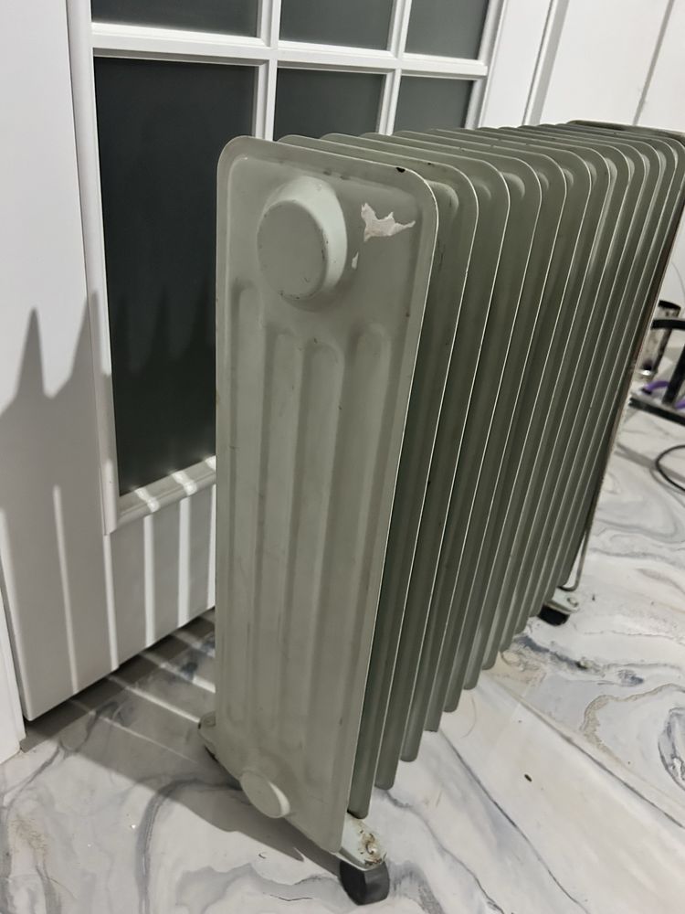 Масляный обогреватель