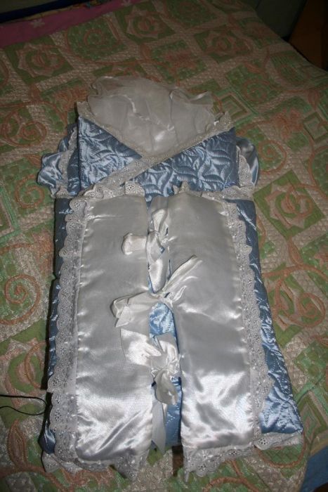 продам шикарный конверт на выписку для новорожденного.