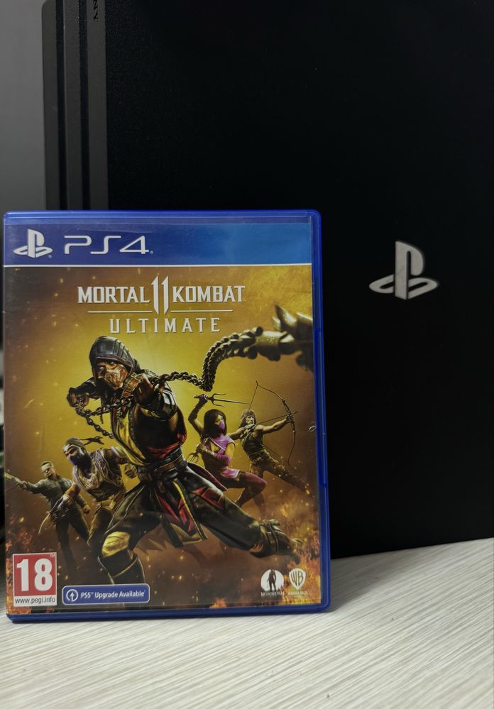 PlayStation 4 Pro + 4 джойстика и 7 игр