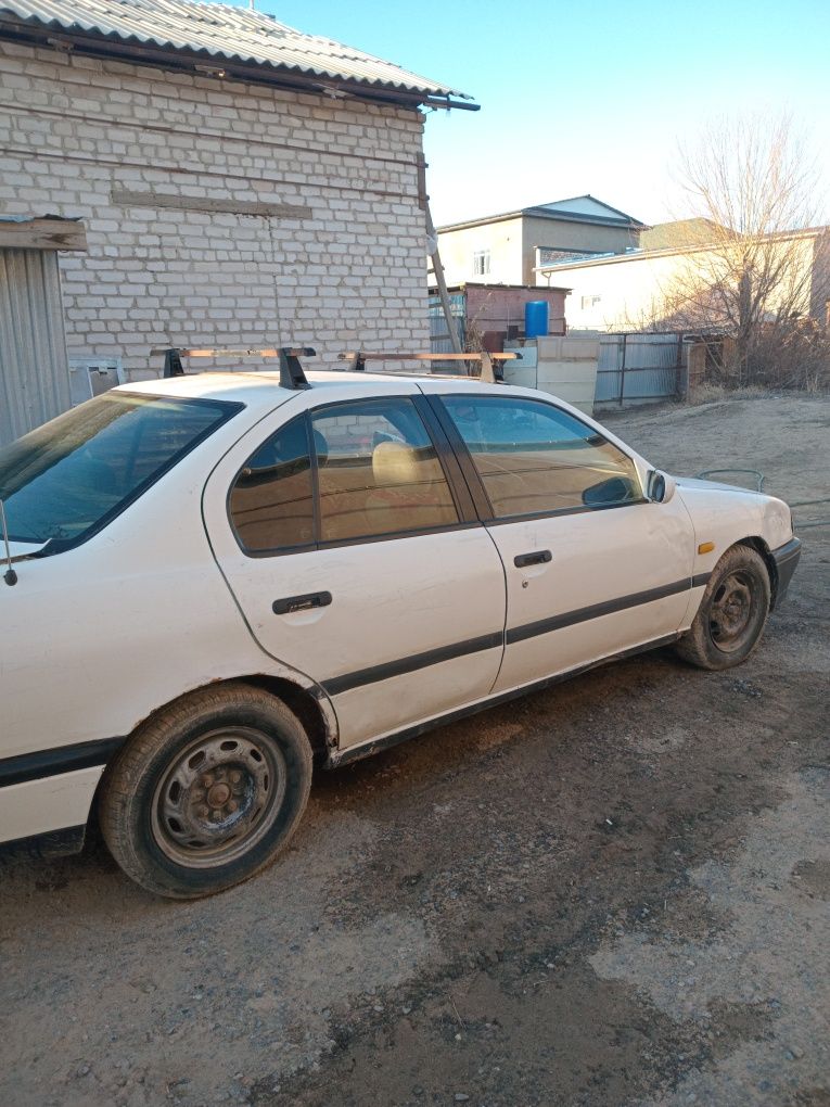 Автомобиль Нисан прнмерп