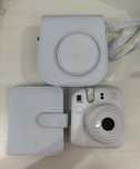 Instax 12 mini- естеліктерді бірден қағазға шығарып, сатуға өте ынғайл