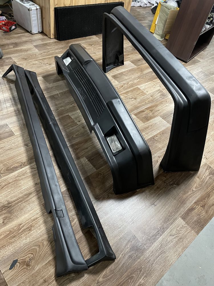бампер Мерседес 124,тюнинг 202,140,211,210 w124 ешка,пороги,накладка