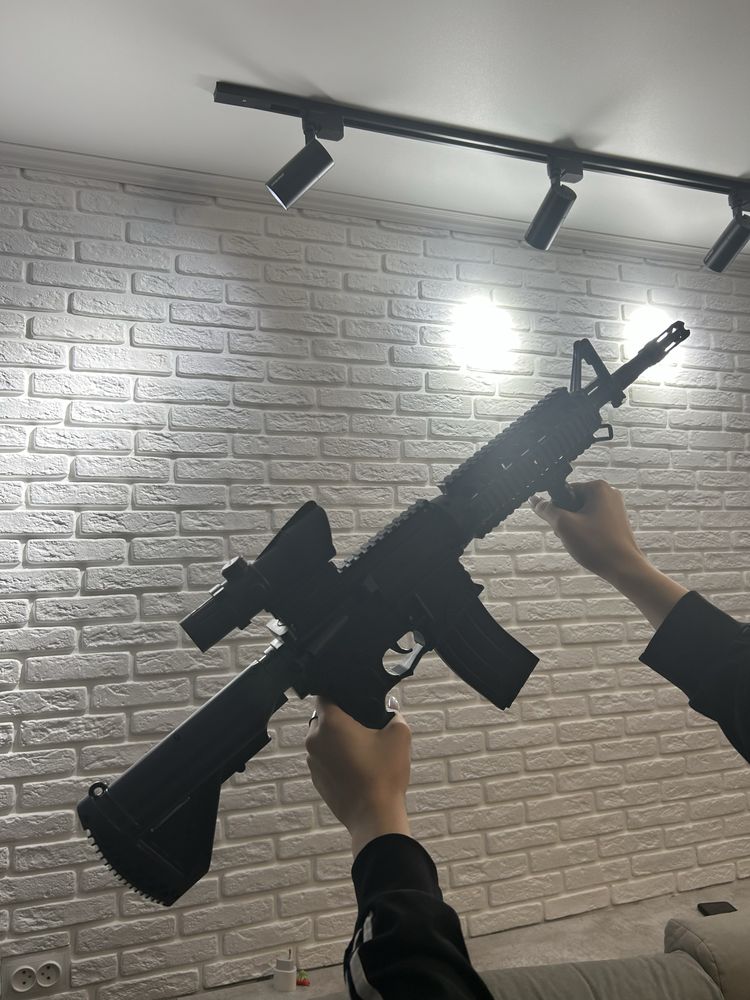 Игрушечный автомат с орбизами