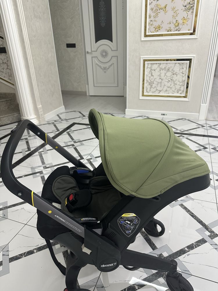 Коляска-автокресло Doona Simple Parenting