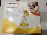Молокоотсос Medela mini electric
