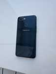 Телефон Oppo AX7