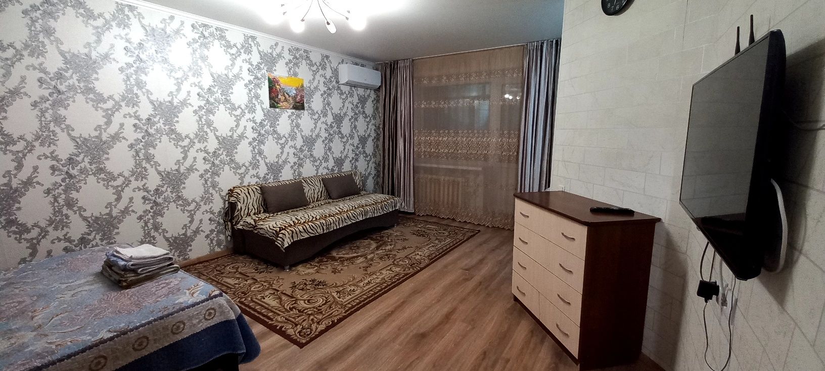 Часы район Белочки. Катаева угол Ломова