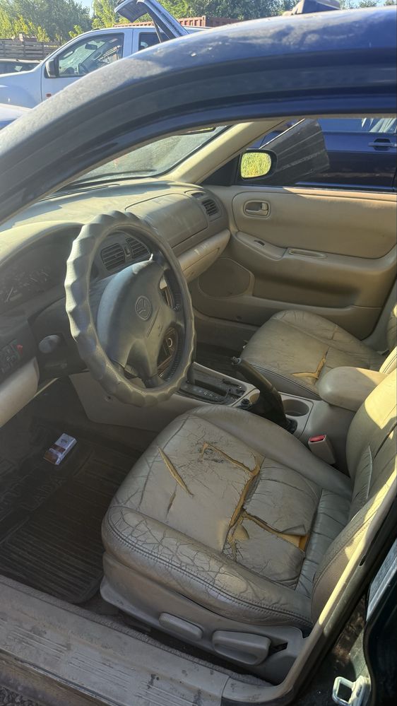 Продам mazda millenia без учета заводится едет