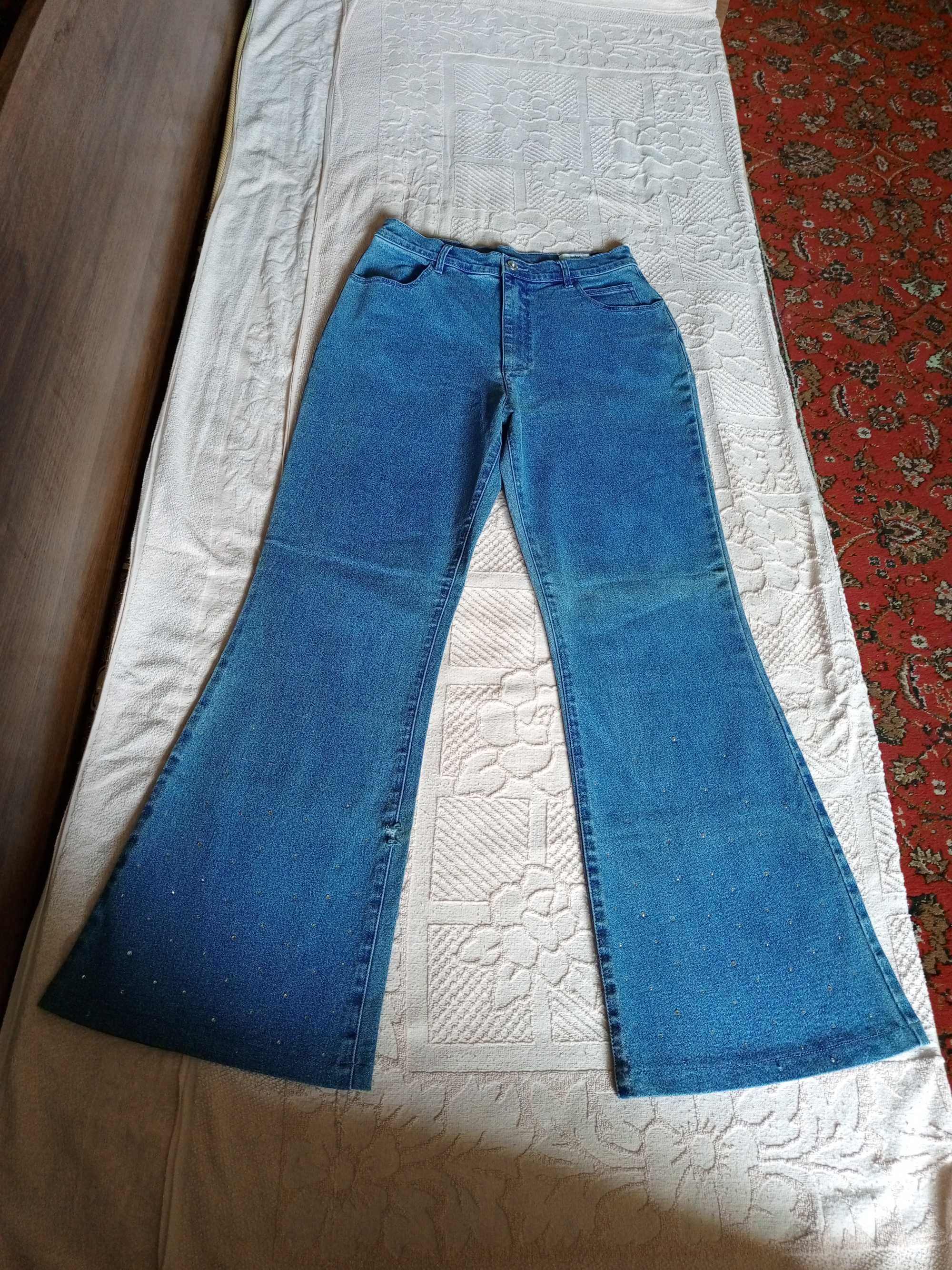 Продам женские джинсы