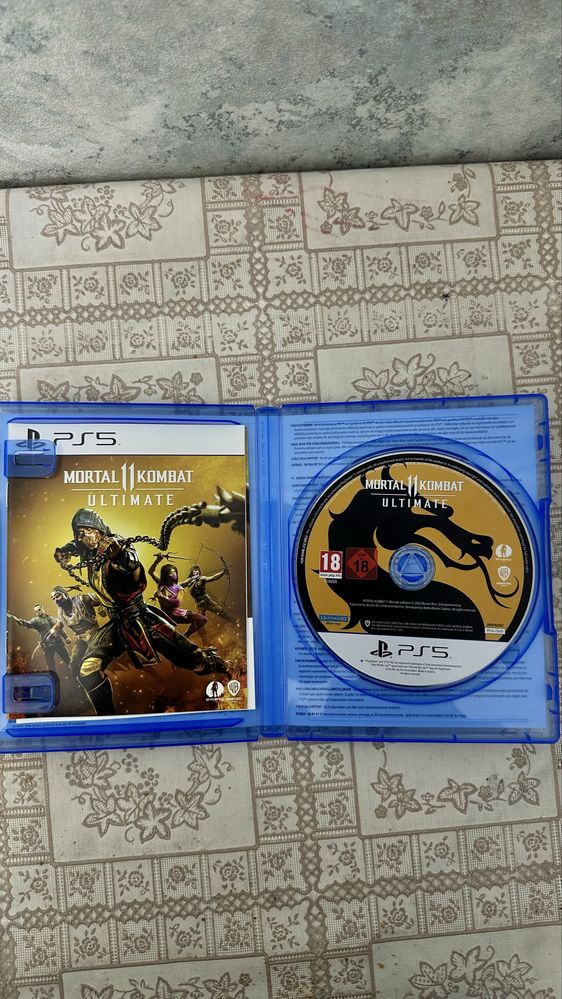 Игровой диск MK11 Ultimate(PS5)-отличное состояние,код уже использован