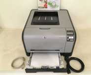 Лазерный цветной принтер HP Color LaserJet CP1515n сетевой