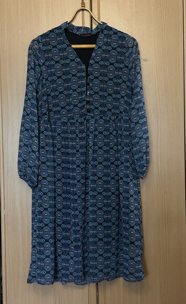 Женские платья.