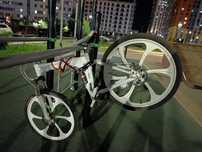 Велосипед BMW задний колесо спустило