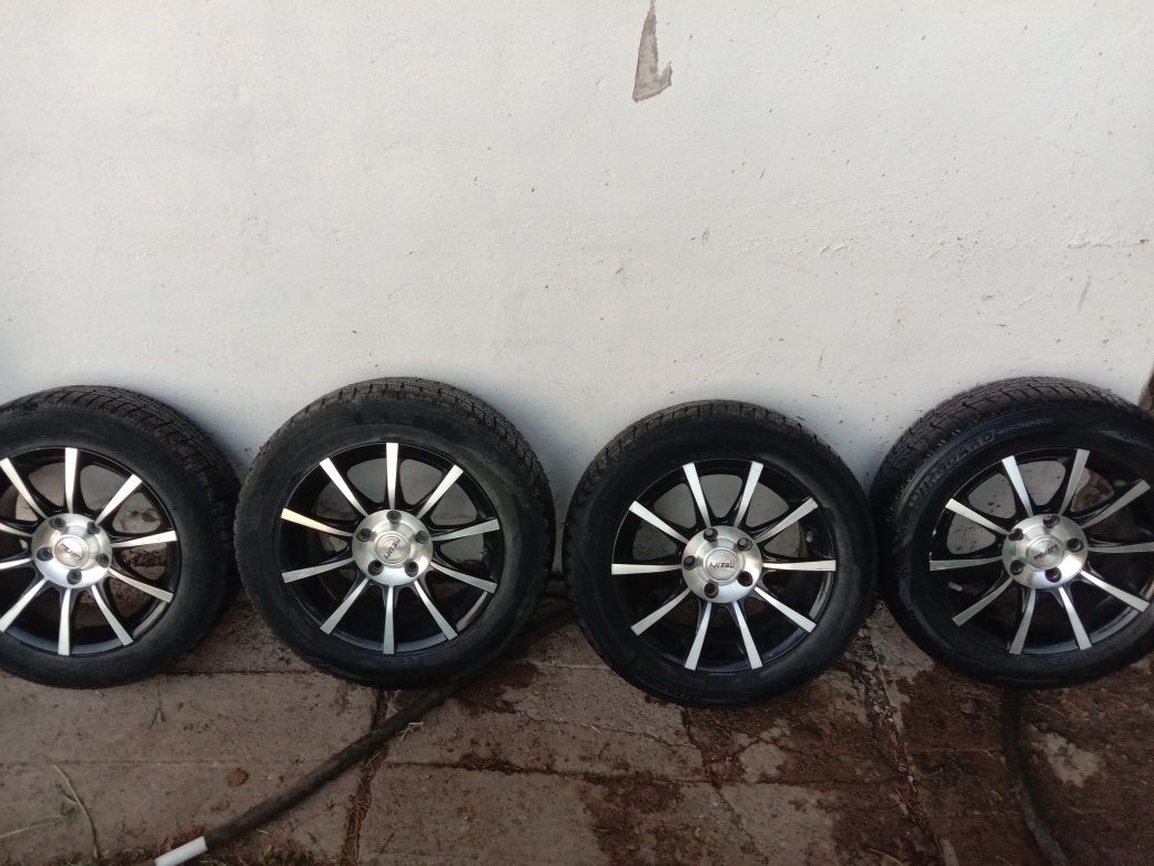 Продам титановые диски р 15 с резиной