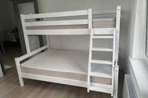 Продам качественную двухъярусную кровать с матрасами