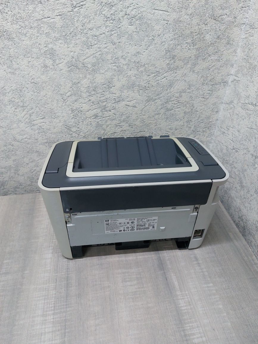 HP LaserJet P1505
принтер