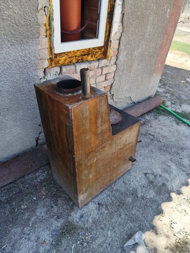 Продам Угольный чугунную печку(Сапог)