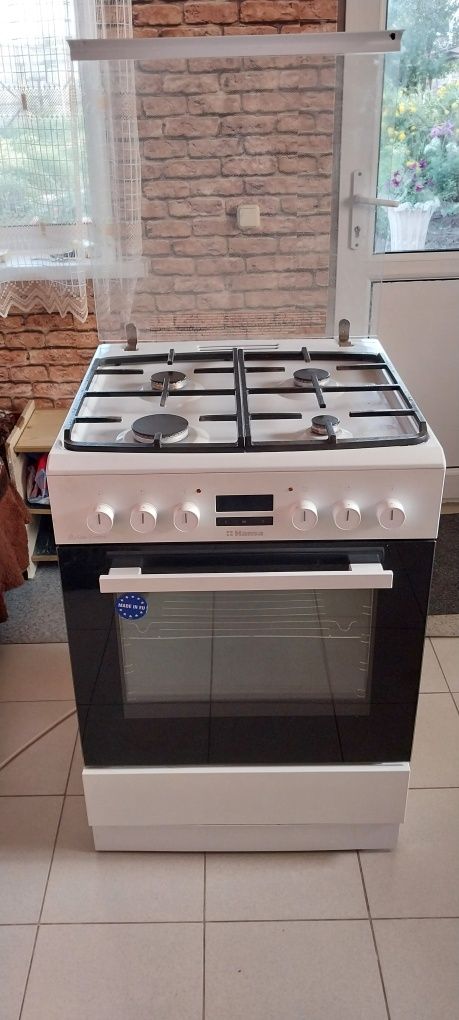Продам газовую плиту HANSA c электродуховкой
