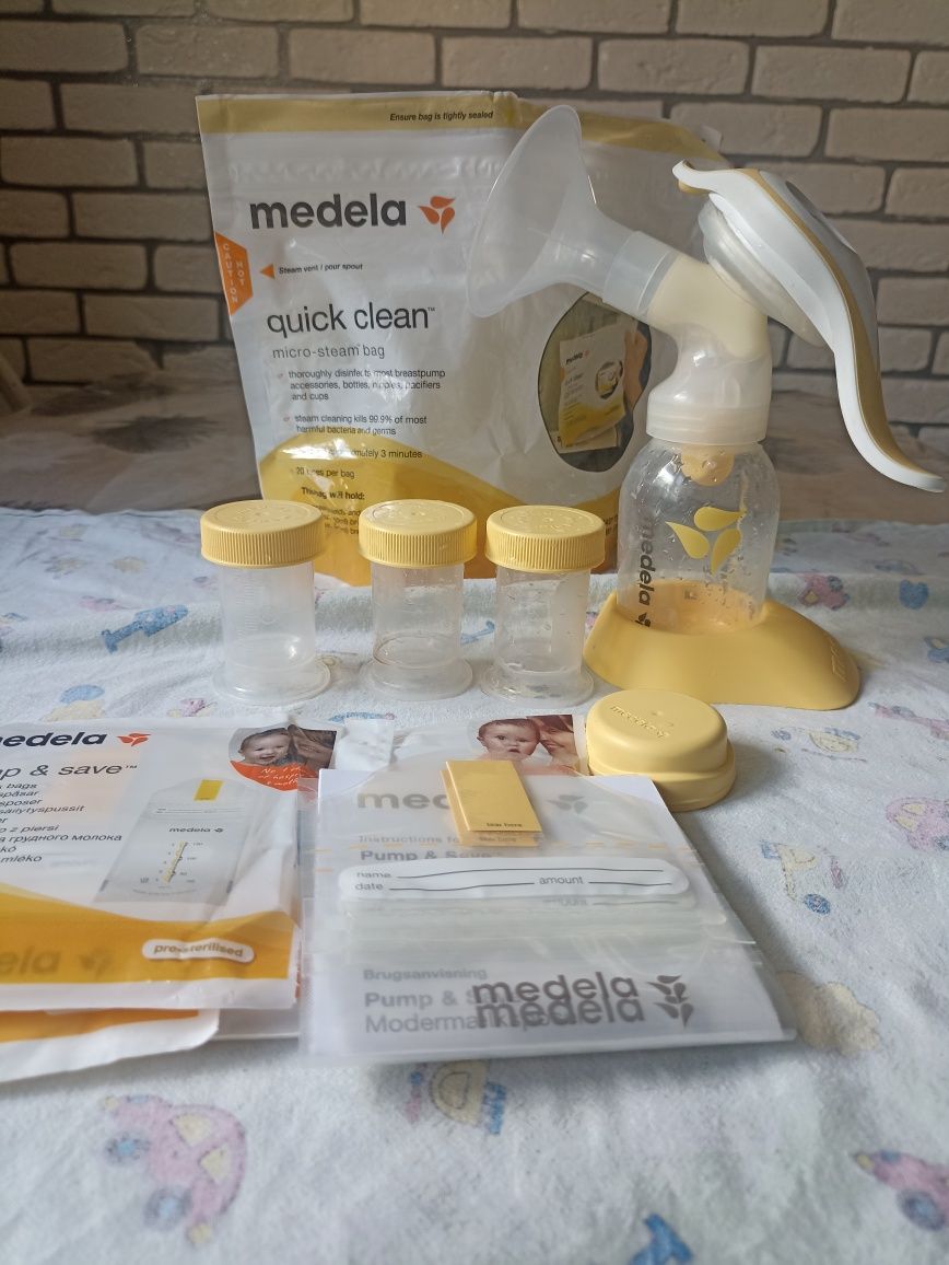 Молокоотсос Medela  ручной двухфазного сцеживания