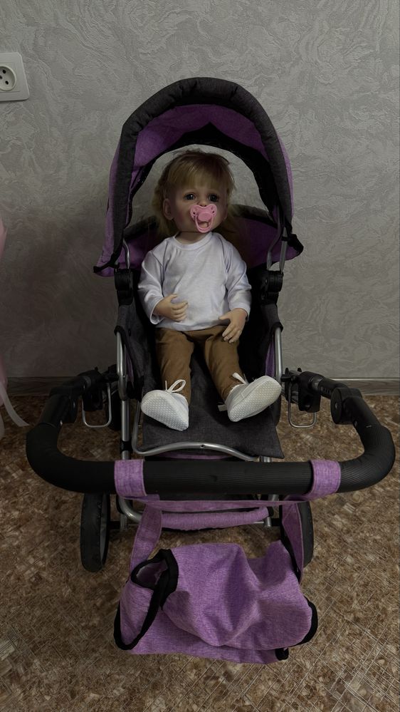 Продам игрушечную косяску